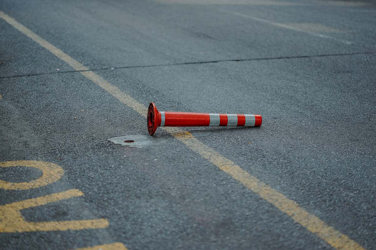 kuala lumpur red and white traffic cone street